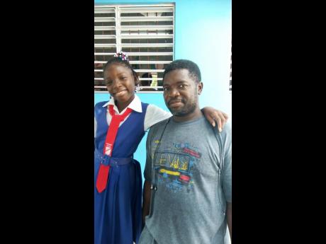 Leroy Thompson and his daughter Valena.