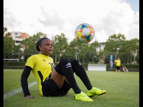 Trudi Carter shows off her ‘keep it up’ skills yesterday ahead the Reggae Girlz Group C encounter against Australia today.