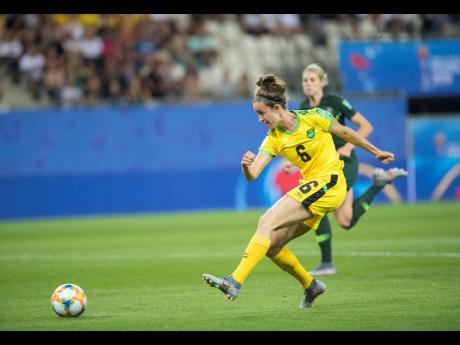 Jamaica’s Havana Solaun shoots and scores in the 49th minute against Australia yesterday to become Jamaica’s first goalscorer at a FIFA Women’s World Cup.