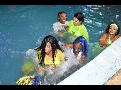 The ladies gets a splash in the pool