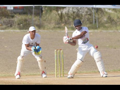Credit: Shorn Hector Shorn Hector/photographer
Batsman André McCarthy of Junction Ballards Valley in action against Junction Bull Savannah during the St Elizabeth parish final of the SDC/ Wray & Nephew National Community T20 Cricket Competition