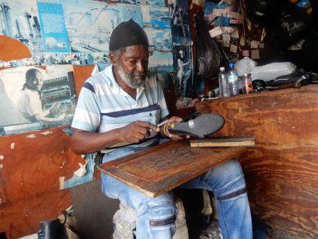 Kenneth Lewis has been repairing shoes for 45 years.