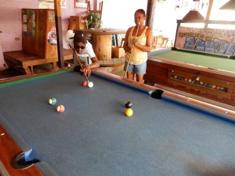 A game of pool is always on at Foundation Bar.