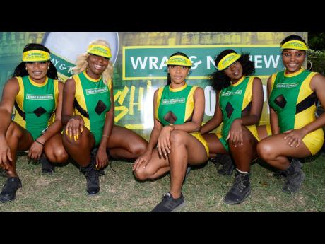 Wray & Nephew girls pose for the camera during an SDC/Wray & Nephew T20 cricket match at Chedwin Park on Sunday, July 7, 2019.