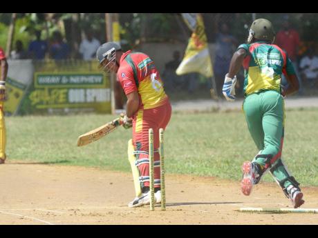 Ramon Davidson of Junction Ballards Valley is bowled by Jevaugh Hinds of Gayle at the Three Hills Oval in St Mary in the SDC/Wray & Nephew National Community T20 cricket competition on Sunday, July 21, 2019. Junction Ballards were eliminated from the competition by Orange Hill yesterday.