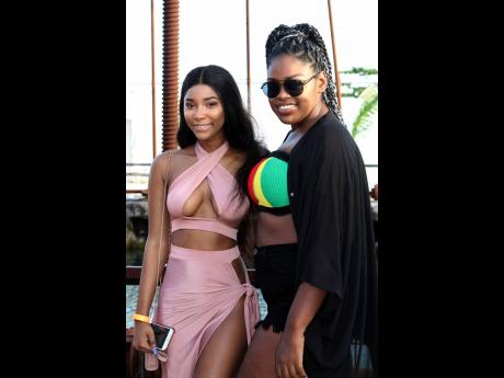 Yhaneil Garnett (left) and Shanice Hill, two Jamaicans that came out to compare the daytime sessions of Barbados and back home. 