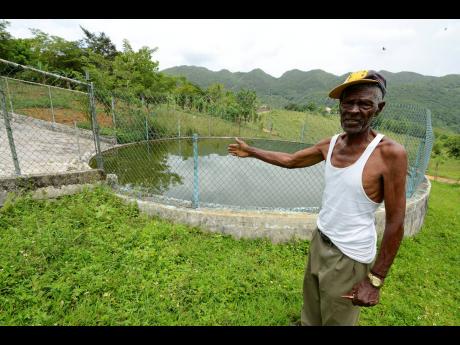 Gibraltar resident Charles Campbell says persons have refused to use water from this public tank after a body was found in it last year.