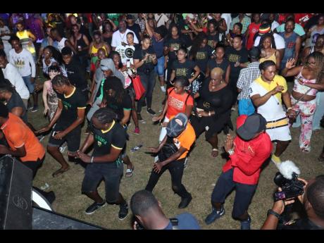Dancehall fans enjoy themselves at the Reggae Sumfest Street Dance in Montego Bay, St James, last month.