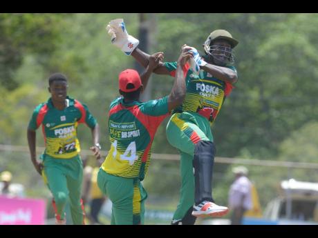 Gayle Cricket Club’s players celebrate after taking a vital wicket against Johnson Mountain in the semi-final of the SDC/Wray & Nephew National T20 Community Cricket competition.
