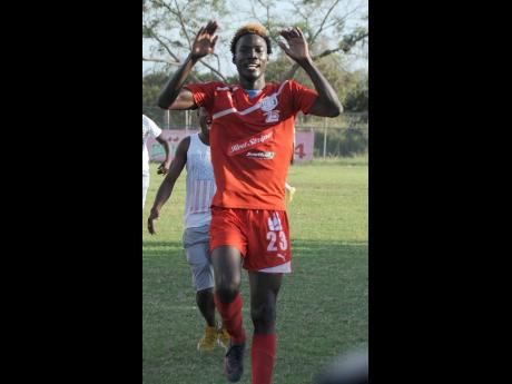 Credit: Ian Allen Shamar Nicholson celebrates after scoring a goal for Boys’ Town in the 2016-17 Red Stripe Premier League season.