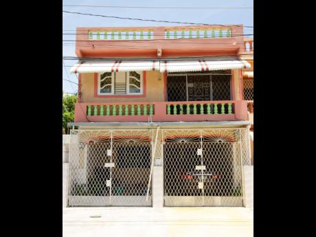 Photo shows the home of the Manning family in Cumberland, Portmore.