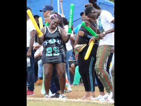 Spectators celebrate during the third-place play-off at the Ultimate Oval in Discovery Bay, St Ann, on Sunday.