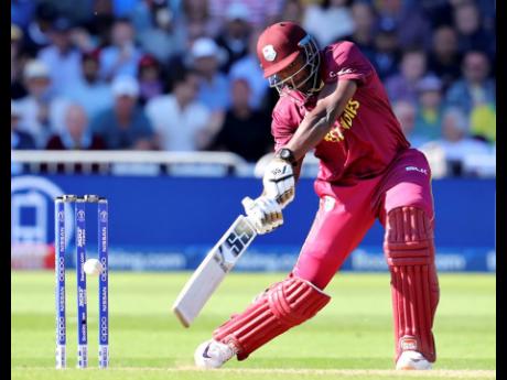 Credit: Rui Vieira West Indies’ Andre Russell bats during the Cricket World Cup.