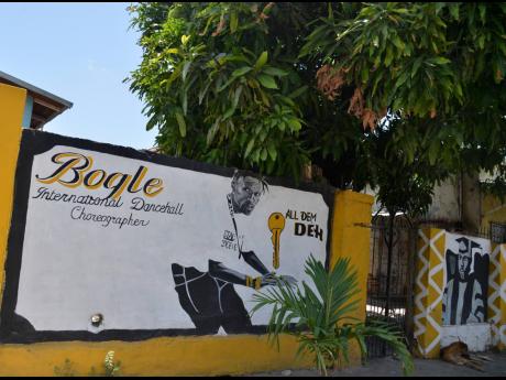 A mural at the gate of the house Bogle once callled home.