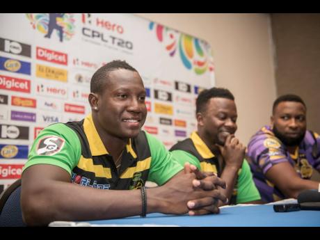 Credit: Gladstone Taylor Jamaica Tallawahs acting captain Rovman Powell (left), head coach Donovan Miller (centre) and Trinbago Knight Riders captain Kieron Pollard address the media at a Caribbean Premier League press conference at The Jamaica Pegasus hotel yesterday.