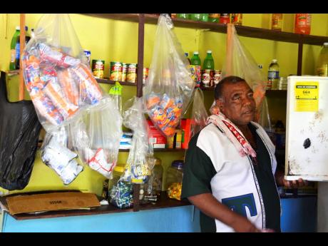 Credit: Errol Crosby Ira Roach inside his shop on Whitney Drive, Mocho, Clarendon.