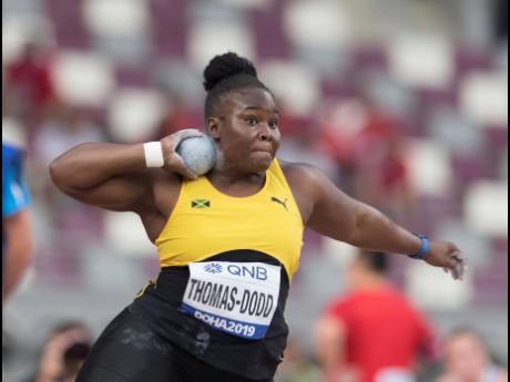 Danniel Thomas-Dodd competing in the shot put qualifiers yesterday.