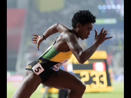 Rushell Clayton of Jamaica is off  in the final of the women’s 400m hurdles in Doha, Qatar.