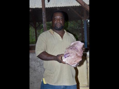 3. Alvin Campbell shows off a choice cut of meat.