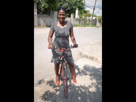 Shellysha McCarthy and her bicycle who she calls ‘My baby’.