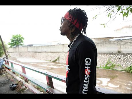 Savage recalls saving three people who were being washed away in a Guardsman truck 
eight years ago.