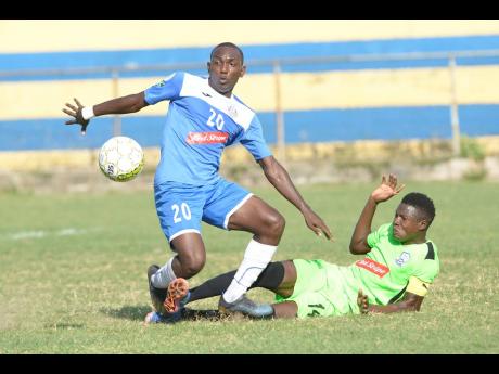 Credit: Portmore United’s Rondee Smith shakes off a challenge from Molynes United Sergeni Frankson during their Red Stripe Premier League match at the Constant Spring Sports Complex yesterday.Portmore United’s Rondee Smith shakes off a challenge from Molynes United Sergeni Frankson during their Red Stripe Premier League match at the Constant Spring Sports Complex yesterday.