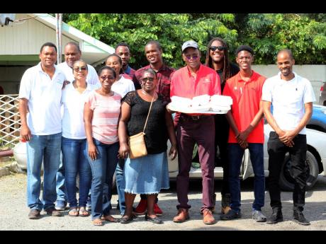 The Spatial Innovision team gets ready to go out and deliver food throughout the Swallowfield community. 