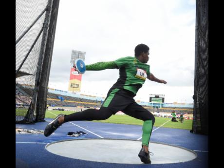 Kai Chang of Calabar High School competes in the Class One boys’ discus throw at the ISSA/GraceKennedy Boys and Girls’ Athletics Championships on March 28, 2019.
