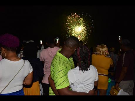 Narmeo and Tashana take in the fireworks after a spectacular marriage proposal.