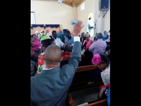This photo shows the alleged miracle taking place in the church.