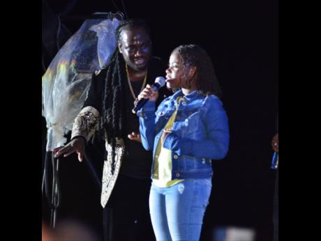 I-Octane performs with his daughter.