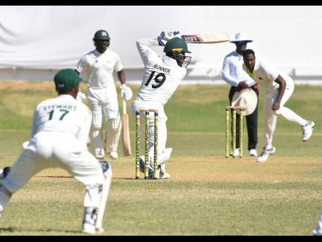 Jamaica Scorpions batsman Nkrumah Bonner (19) plays a shot through the offside during the final day of play against the Windward Islands Volcanoes in the Cricket West Indies Professional Cricket League Regional 4-Day Championship at Sabina Park, Kingston, yesterday.