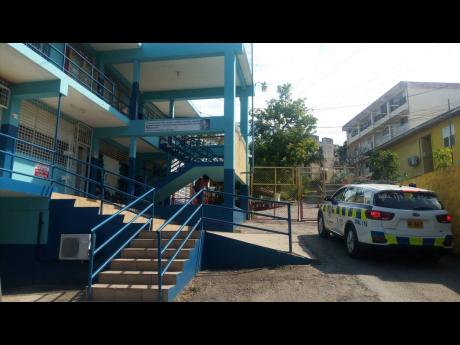  A police unit responding to the incident at Cornwall College in Montego Bay.