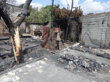 What remains at James Town in Kencot, St. Andrew after a massive fire last Saturday.