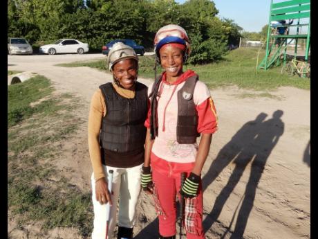 Photo By Robert Bailey
Female apprentice jockeys Abigail Able (left) and Tamicka Lawrence.
