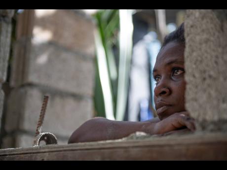 Tashorna Deslandes’s one-year-old son was rescued from one of the burning houses.