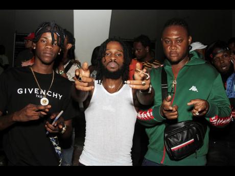 Dancehall entertainers Kash, Quada and Hot Frass backstage at Ratingz.