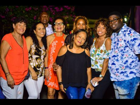 Friends chill at Bacchanal Fridays 2020 launch in New Kingston.