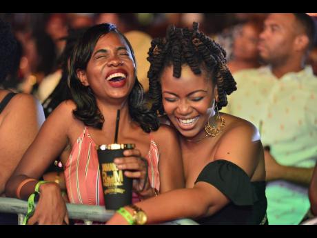 Girlfriends enjoying themselves at  Jamaica Rum Festival 2020. Presley Hype says he feeds off the energy of the patrons.