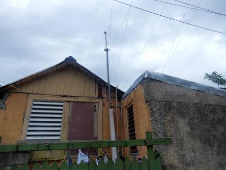 Credit: Akera Davis The JPS estimates the theft rate of electricity in Jones Town, to be about 90 per cent.