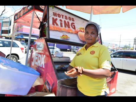 Credit: Kenyon Hemans Kerry-Ann Porter has been experiencing a downturn in business since the first case of COVID-19 was detected on the island.