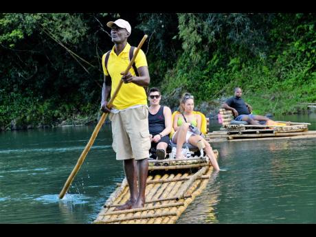 Credit: Tourist rafting on the Rio Grande in Portland.