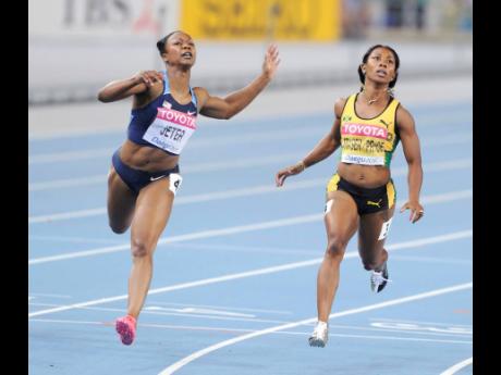 Jamaica’s Shelly-Ann Fraser-Pryce (right) crosses the finish line behind American Carmelita Jeter in the women’s 100 metres final at the 2011 World Athletics Championships. Jeter won in 10.90 seconds, while Fraser-Pryce placed fourth in 10.99.