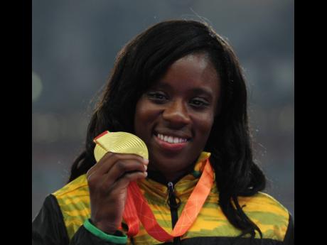 A proud Danielle Williams displays her gold medal.