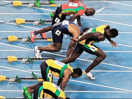 Usain Bolt (third from bottom), false-starts in the men’s 100-metre final at the World Athletics Championships in Daegu, South Korea. 