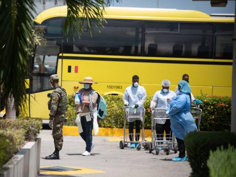 Some 200 Jamaicans returned from Florida, New York and Canada on Wednesday under the controlled re-entry programme instituted to contain the spread of the novel coronavirus.