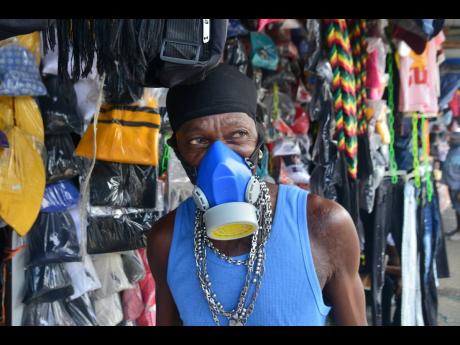 Credit: Kenyon Hemans Bertie-Paul Taylor has had this mask for seven years, and he has brought it out to fight the coronavirus.