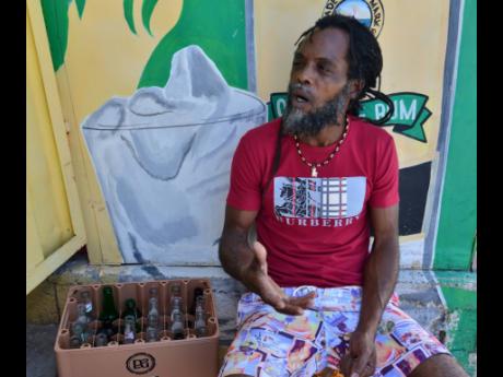 Marvin Hibbert, a self-taught artist from Trench Town.
