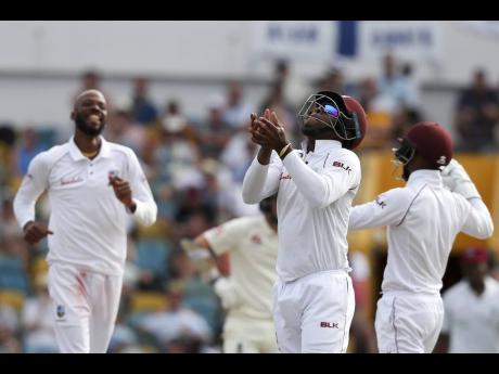 West Indies’ Shimron Hetmyer [centre]celebrates after taking the catch to dismiss England’s Ben Foakes during day four of the first Test match at the Kensington Oval in Bridgetown, Barbados, on Saturday, January 26, 2019.
