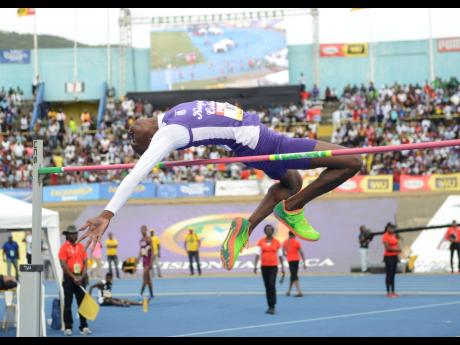Kingston College’s Blaine Byam wins the Class Two Boys high jump, clearing 2m on day five of the ISSA/GraceKennedy Boys and Girls’ Athletics Championships at the National Stadium in Kingston on Saturday, March 30, 2019. 